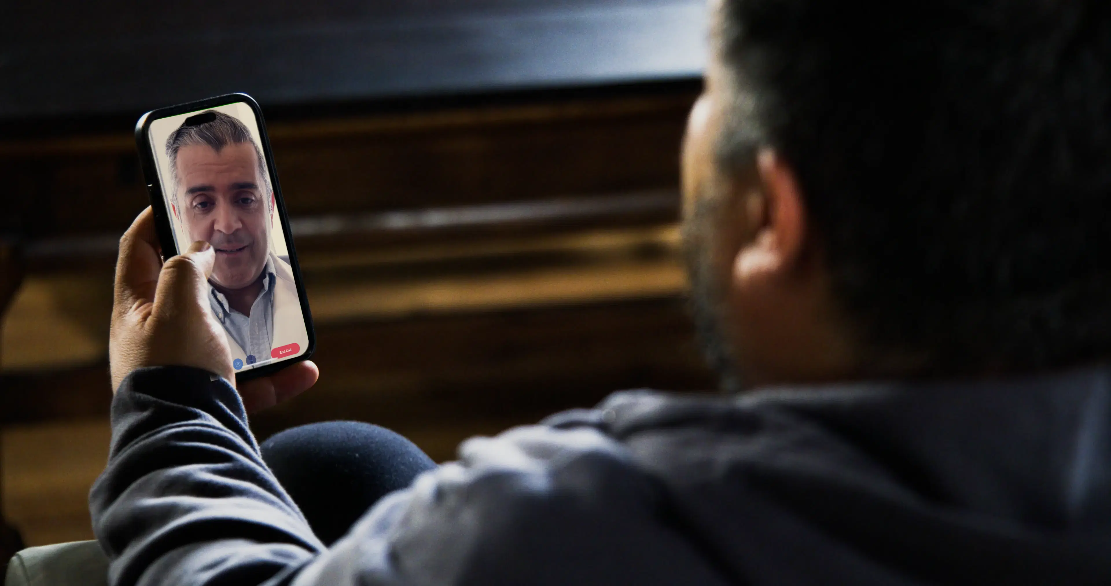 Emergency team receiving specialist support during transport